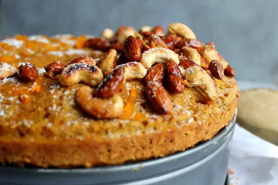 Butternut Bundt Cake with Orange Glaze & Toasted Nuts. Completely delicious butternut cake made with wholewheat flour & reduced sugar. Dense & perfectly moist, amazing thanksgiving cake. Perfect holiday sweet treat! | berrysweetlife.com