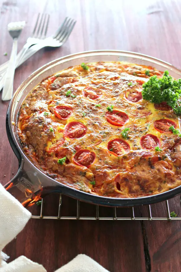 A simple to make Tomato & White Cheddar Crustless Tart - Baked in the oven in a skillet, this is a healthier tomato tart full of flavour and goodness! | berrysweetlife.com