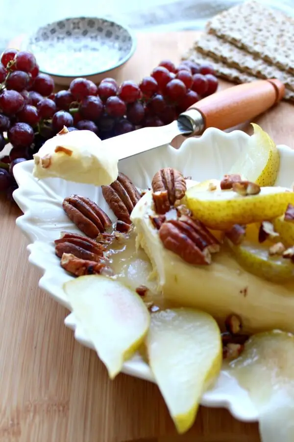 Cream Cheese Appetizer with Poached Pear & Toasted Pecans. A quick & easy recipe that looks and tastes incredible. Your friends & family will be so impressed! Perfect for any occasion | berrysweetlife.com