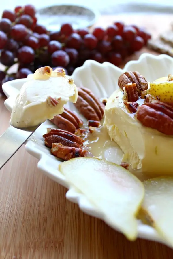 Cream Cheese Appetizer with Poached Pear & Toasted Pecans. A quick & easy recipe that looks and tastes incredible. Your friends & family will be so impressed! Perfect for any occasion | berrysweetlife.com