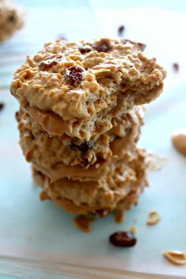 Oaty Raisin Peanut Butter Sandwich Cookies. Healthier oatmeal brown flour & raisin cookies with a peanut butter filling. A delicious snack or tea time treat. Your kids will love these! | berrysweetlife.com