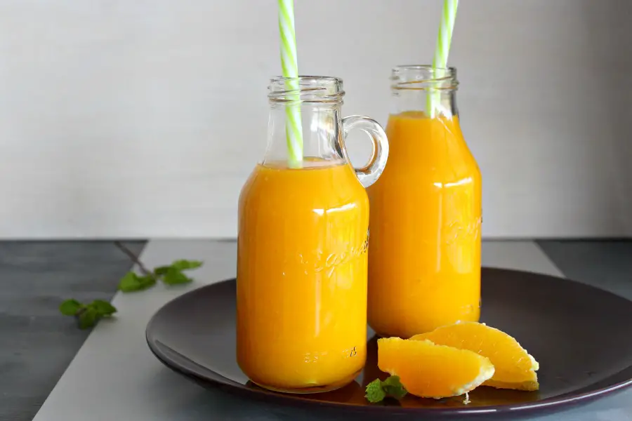 Mango Orange and Ginger Hot Smoothie. A fruity, healthy & tasty hot smoothie for chilly mornings. Your whole family will love these! | berrysweetlife.com