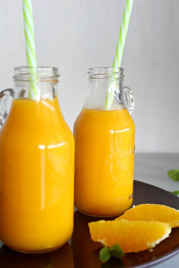 Mango Orange and Ginger Hot Smoothie. A fruity, healthy & tasty hot smoothie for chilly mornings. Your whole family will love these! | berrysweetlife.com