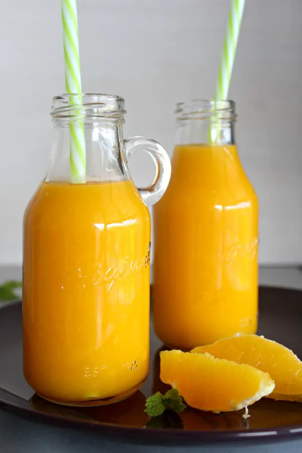 Mango Orange and Ginger Hot Smoothie. A fruity, healthy & tasty hot smoothie for chilly mornings. Your whole family will love these! | berrysweetlife.com