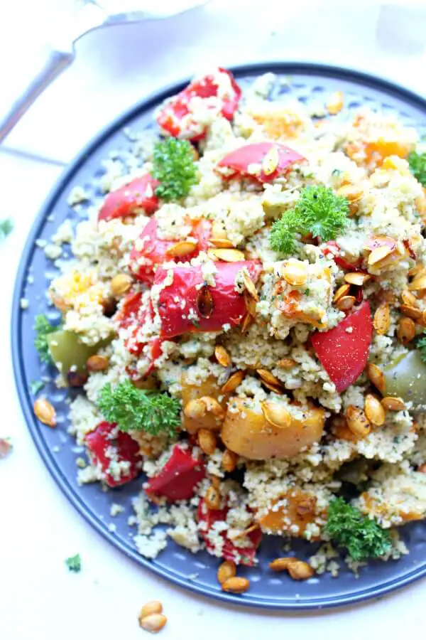 Roasted Butternut Squash Cous Cous Salad with Pesto Dressing. An easy, healthy vegetarian salad that is bursting with colour and flavour. You can't go wrong with this healthy dish! | berrysweetlife.com