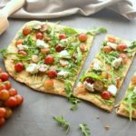 Wholewheat Grape Rocket & Goats Cheese Healthy Pizza. A recipe you need! Delicious vegetarian pizza with so much flavour and goodness. Perfect dinner recipe for the whole family | berrysweetlife.com