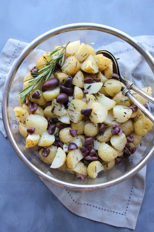 Black Olive Rosemary New Potato Salad. An easy going salad that is simple to make, healthy & delicious! Everyone will be asking for the recipe! | berrysweetlife.com