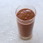 A super chocolatey, thick and creamy, healthy Chocolate Cinnamon Coconut Smoothie made with cocoa powder, bananas, dates, coconut milk. Dairy free, vegan | berrysweetlife.com