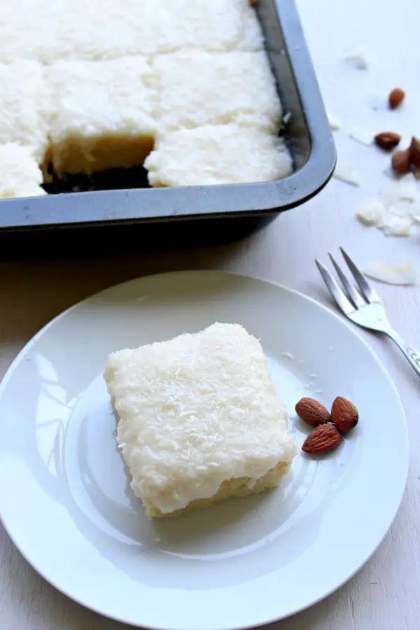 Coconut Almond Greek Yoghurt Sheet Cake. An easy cake recipe that's perfect for Easter Sunday or any special occasion. Kids & adults will love this cake! | berrysweetlife.com