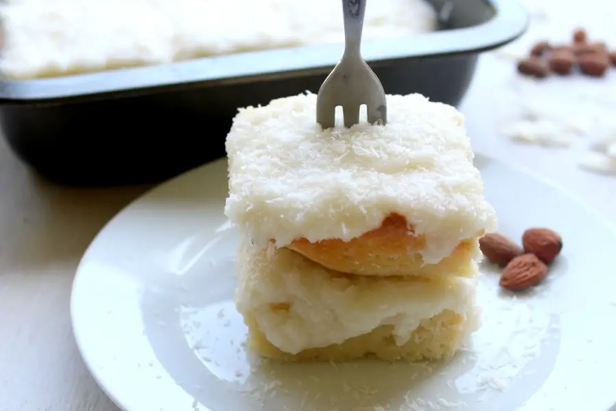 Coconut Almond Greek Yoghurt Sheet Cake. An easy cake recipe that's perfect for Easter Sunday or any special occasion. Kids & adults will love this cake! | berrysweetlife.com