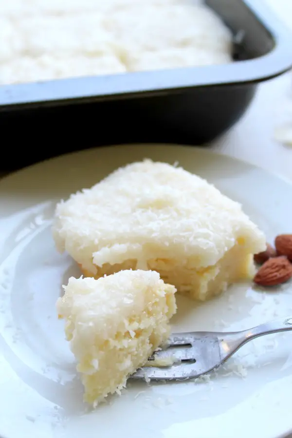 Coconut Almond Greek Yoghurt Sheet Cake. An easy cake recipe that's perfect for Easter Sunday or any special occasion. Kids & adults will love this cake! | berrysweetlife.com