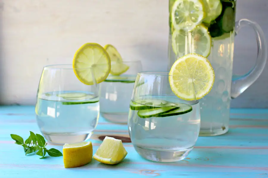 Lemon Basil Cucumber Infused Water. A refreshing summer drink perfect for a hot day by the pool! Such a healthy way to quench your thirst | berrysweetlife.com