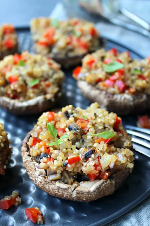 Pepper Quinoa Stuffed Giant Mushrooms. Fragrant, delectable & oh so healthy! Perfect as a side dish or a light meal they take only 35 minutes to make! | berrysweetlife.com