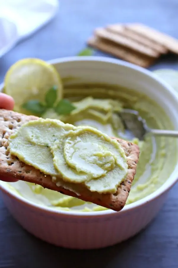 5 Minute Avocado Basil Hummus. Got 5 minutes? Make this healthy, tasty hummus. It goes with crackers, sandwiches, wraps or pasta | berrysweetlife.com