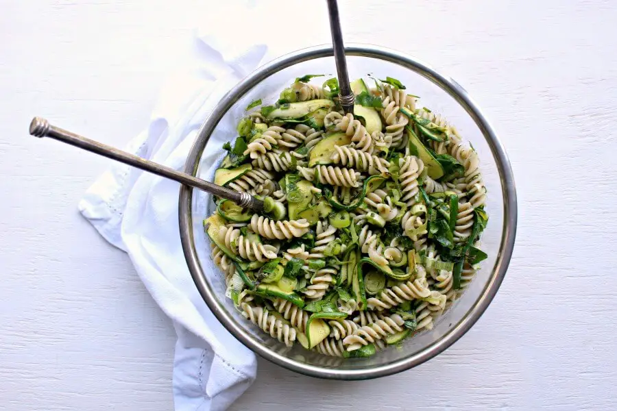 Green Goddess Pesto Pasta Salad. Get all your greens in one wholesome bowl with this seriously healthy & delicious pasta salad recipe! | berrysweetlife.com