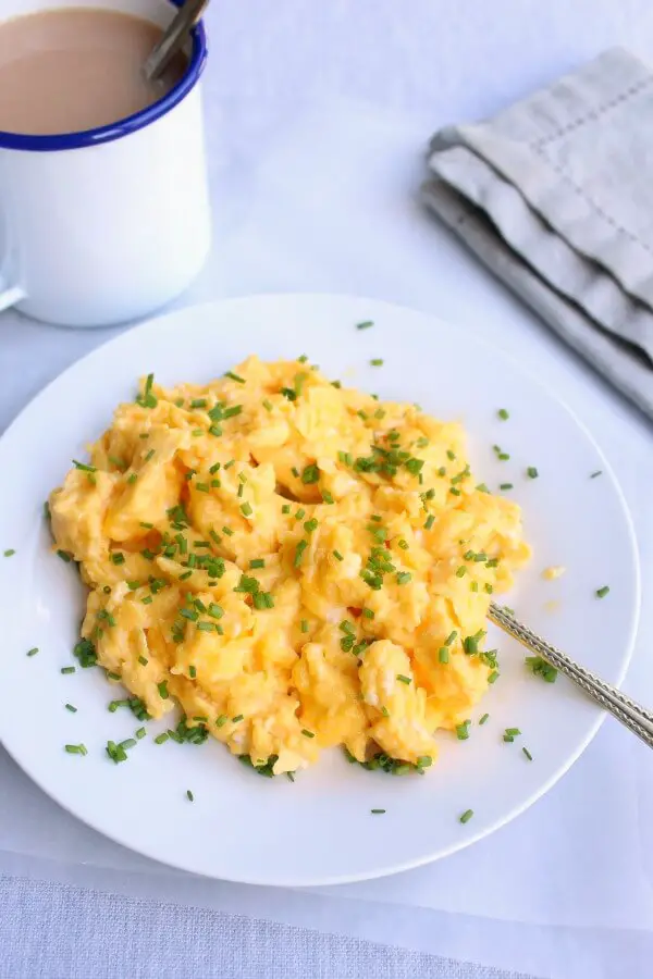 How To Make Perfect Scrambled Eggs. In 4 simple steps you will have CREAMY, bright yellow, delicious scramble EVERY time!! | berrysweetlife.com