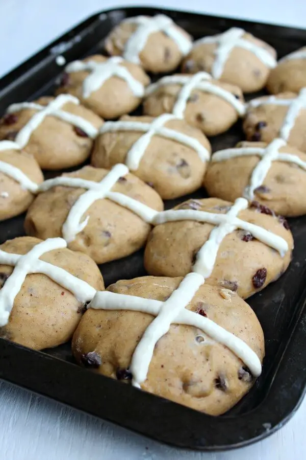 No Knead Easter Hot Cross Buns. The best, easy homemade Hot Cross Buns for Easter - Soft & fluffy, full of spices & raisins with a honey glaze. YUM! | berrysweetlife.com