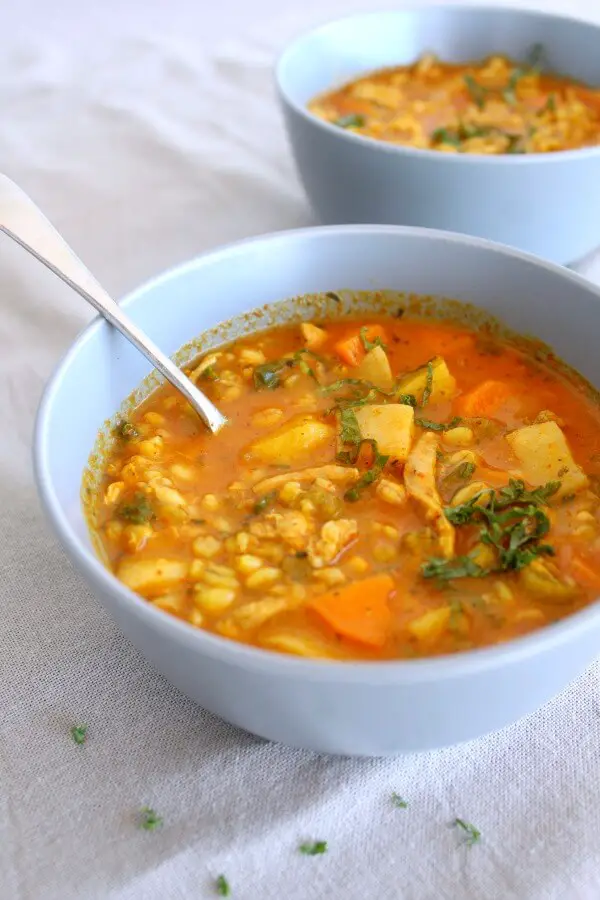 Baked Chicken Barley Kale Stew. A healthy, hearty stew with lots of vegetables, barley & chicken thighs. A great family meal or kitchen supper! | berrysweetlife.com