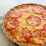 Easy Cheese Crust Tomato Quiche. A no roll, press down cheese and herb crust with a layered tomato and cheese egg filling. Simply YUM! | berrysweetlife.com