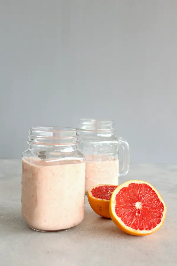 Immune Boosting Grapefruit Banana Smoothie. A nutrient rich, delicious 4 ingredient smoothie that is quick and easy to make. The perfect healthy breakfast or snack! | berrysweetlife.com