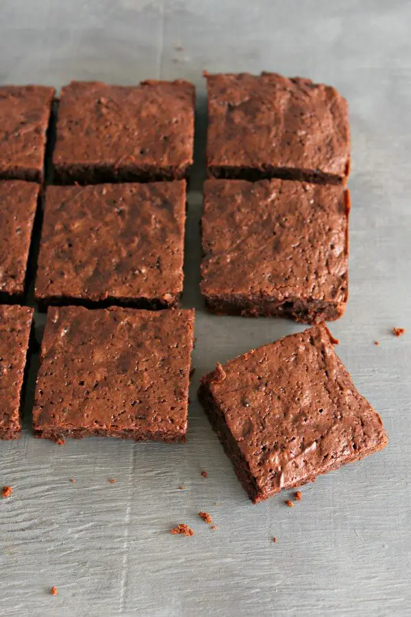 Rosemary Infused Fudgy Chocolate Brownies. The BEST brownies ever! Soft & fudgy in the centre and crispy on top, everyone will love these brownies, plus they're really easy to make! | berrysweetlife.com