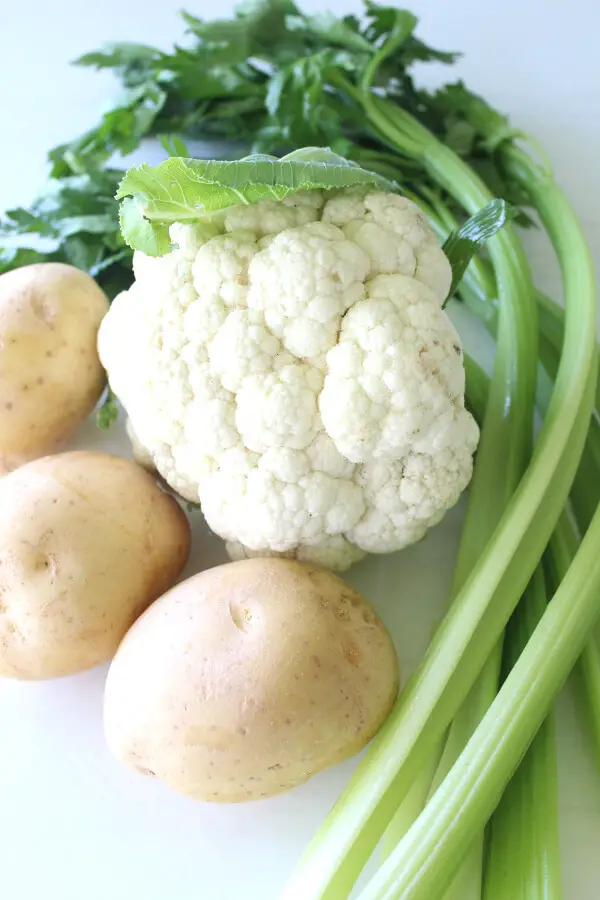 Simple Cauliflower Potato Celery Soup is low carb, vegan, ready in 30 minutes and it's packed with healthy fresh veggies and overflowing with flavour! | berrysweetlife.com