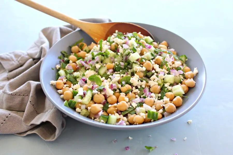 Clean Eating Cucumber Mint Chickpea Salad. A 15 Minute nutrient rich salad that is full of vitamins and protein. A flavourful vegetarian or vegan dish perfect for any occasion | berrysweetlife.com