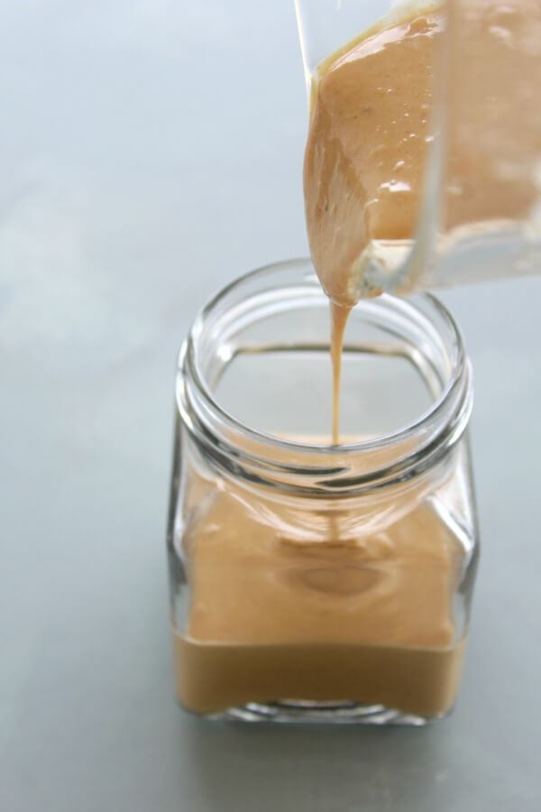 Simple Creamy Peanut Ginger Dressing. A 5 minute dreamy dressing / sauce that is perfect for just about any salad, pasta, couscous or rice dish! | berrysweetlife.com