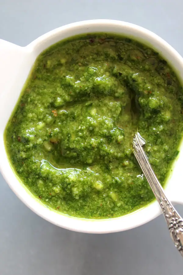 Make easy basil pesto with this Simple Homemade Fresh Basil Pesto recipe, it's beautifully fresh. Made with basil, almonds, olive oil, garlic and parmesan | berrysweetlife.com