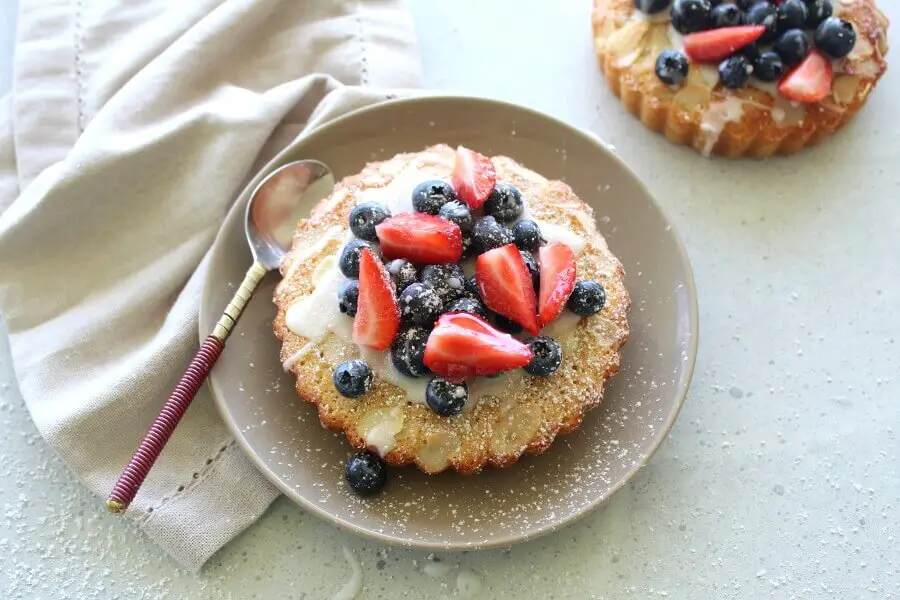 Classic French mini Berry Apricot Almond Tarts recipe - easy to make with ground almonds and shortcrust pastry for a tea time treat or with a little cream or ice cream, a delicious dessert! | berrysweetlife.com