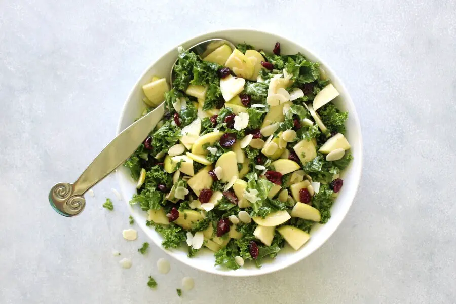 Super healthy, crunchy and tasty Kale Apple Cranberry Salad With Sesame Dressing is quick and easy to make, the ideal side dish for any occasion | berrysweetlife.com