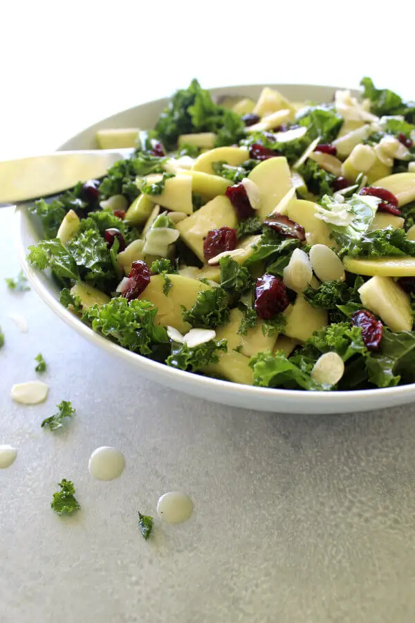 Super healthy, crunchy and tasty Kale Apple Cranberry Salad With Sesame Dressing is quick and easy to make, the ideal side dish for any occasion | berrysweetlife.com