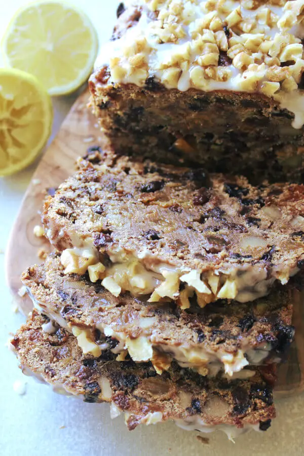 Moist, easy to make fruit and nut loaf recipe with a twist! This Walnut Fruit Loaf With Lemon Icing is the best combination of flavours, enjoy a slice with a cup of tea or coffee! | berrysweetlife.com