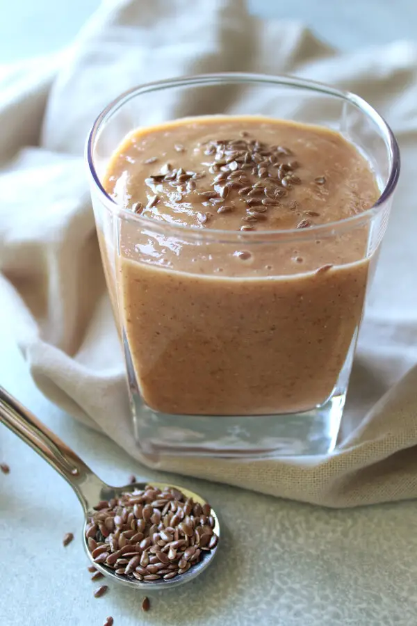 Add protein, fibre, antioxidants and omega 3 to your diet with this tropical fruit vegan Energy Boost Flax Seed Smoothie! | berrysweetlife.com