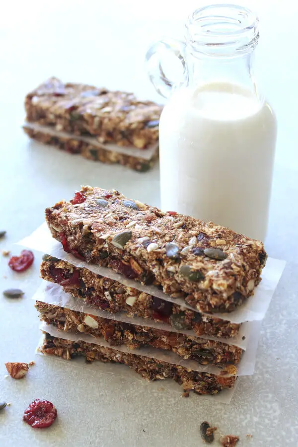 Easy to make, low carb, vegan, sugar free Super Seedy Almond Cranberry Granola Bars that taste wonderful, are crunchy and full of texture, packed with seeds, almonds and cranberries | berrysweetlife.com