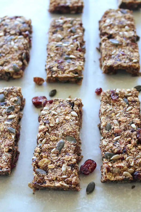 Easy to make, low carb, vegan, sugar free Super Seedy Almond Cranberry Granola Bars that taste wonderful, are crunchy and full of texture, packed with seeds, almonds and cranberries | berrysweetlife.com