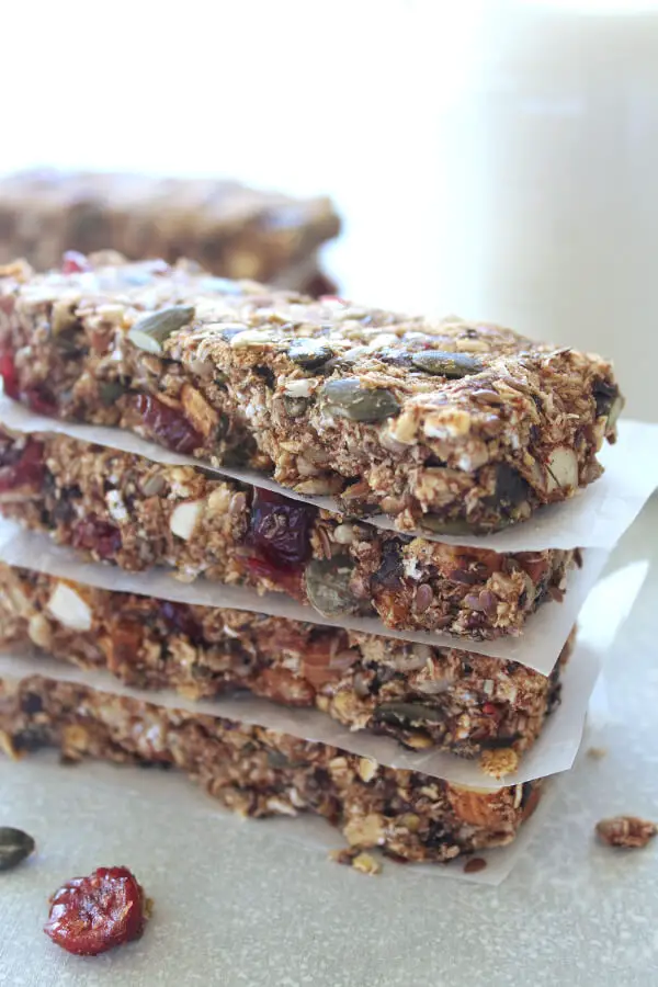 Easy to make, low carb, vegan, sugar free Super Seedy Almond Cranberry Granola Bars that taste wonderful, are crunchy and full of texture, packed with seeds, almonds and cranberries | berrysweetlife.com