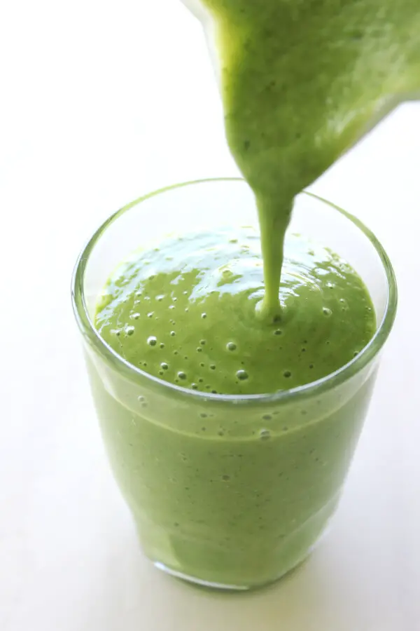 Packed full of vitamins, minerals, antioxidants and fibre - The Best Mango Green Smoothie tastes creamy and amazing! | berrysweetlife.com