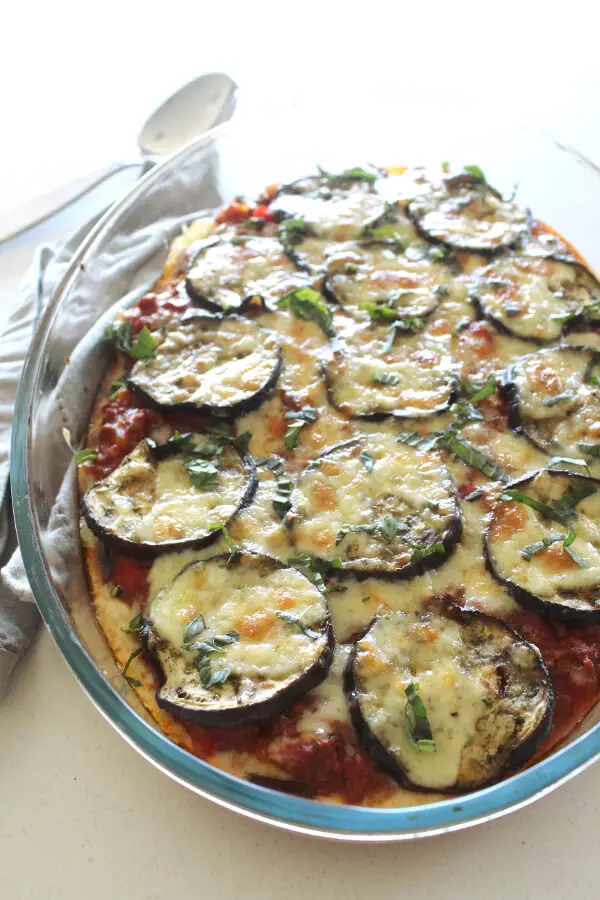 A delicious layered eggplant and mince bake topped with cheese. This is called a Cheats Healthy Beef & Brinjal Moussaka because it’s SO easy to make! | berrysweetlife.com