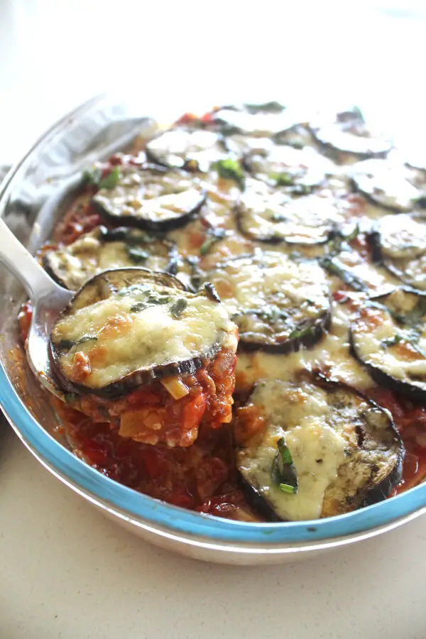 A delicious layered eggplant and mince bake topped with cheese. This is called a Cheats Healthy Beef & Brinjal Moussaka because it’s SO easy to make! | berrysweetlife.com