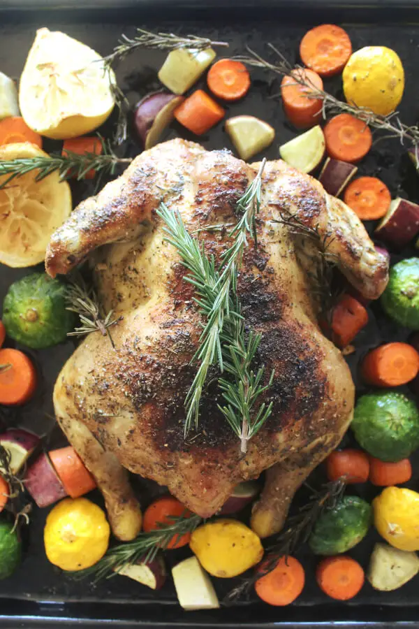 Healthy Lemon Herb Roast Chicken And Veggies recipe delivers crispy skin, juicy, tender and tasty meat with wonderful lemon, rosemary and garlic flavours! | berrysweetlife.com