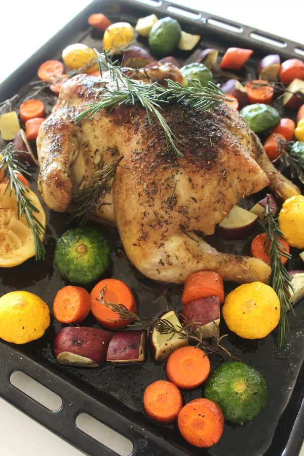 Healthy Lemon Herb Roast Chicken And Veggies recipe delivers crispy skin, juicy, tender and tasty meat with wonderful lemon, rosemary and garlic flavours! | berrysweetlife.com