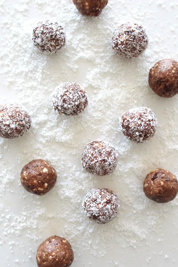 Melt in your mouth smooth, creamy, nutty, sweet and chocolatey! Cacao Coconut Date Bliss Balls are like dessert, yet are a healthy and easy to make snack! | berrysweetlife.com