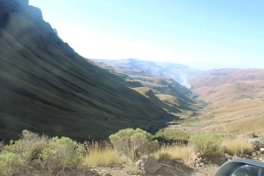 It is SPECTACULARLY beautiful! But, before you decide to drive up or down, there are a few Pros And Cons Of Driving Sani Pass consider! | berrysweetlife.com